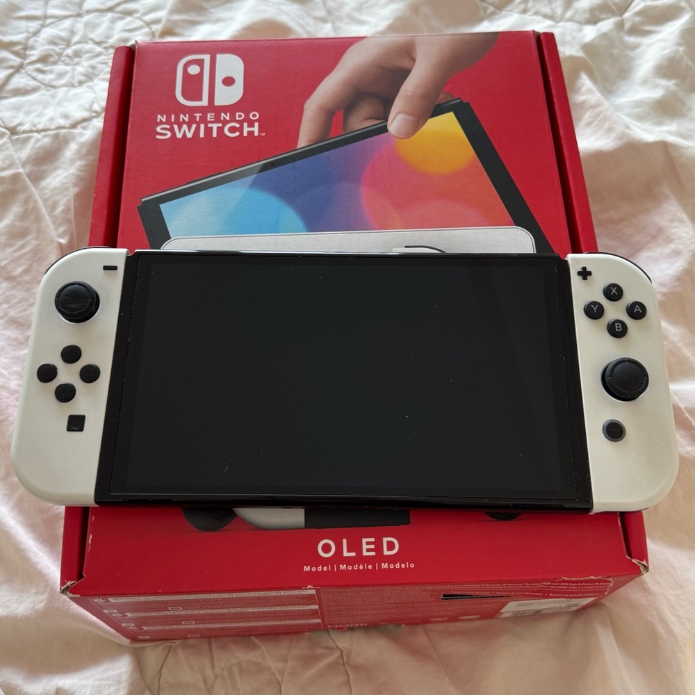 Nintendo Switch OLED with White and Black Joy-Cons